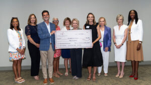 Representatives from St. Matthew’s House and the Women’s Foundation of Collier County gather after the foundation presented a $50,000 grant to support shelter and services for homeless senior women in Collier County.